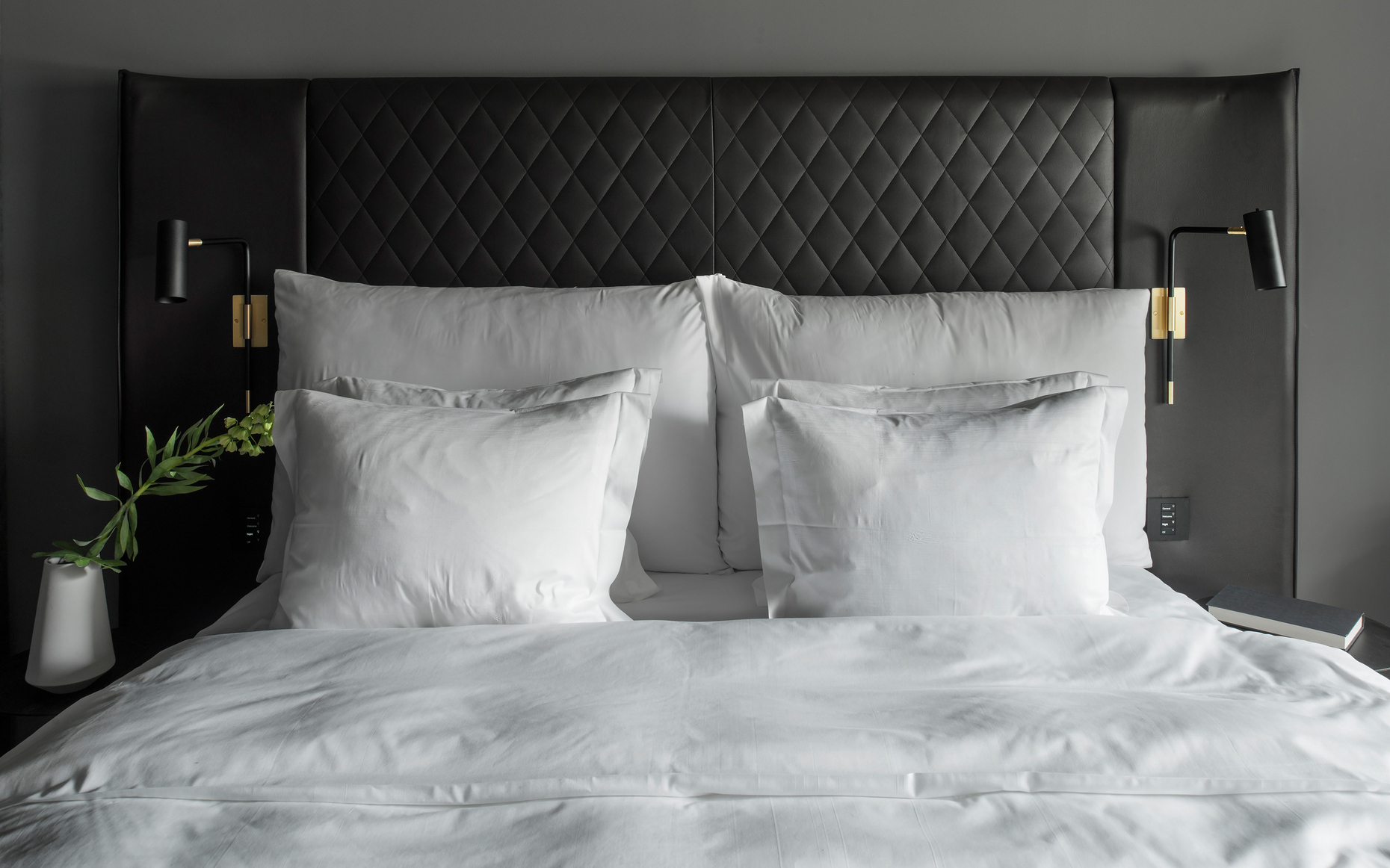 Black beauty: The headboards and upholstery furniture in the rooms of the "At Six" are black as the night.