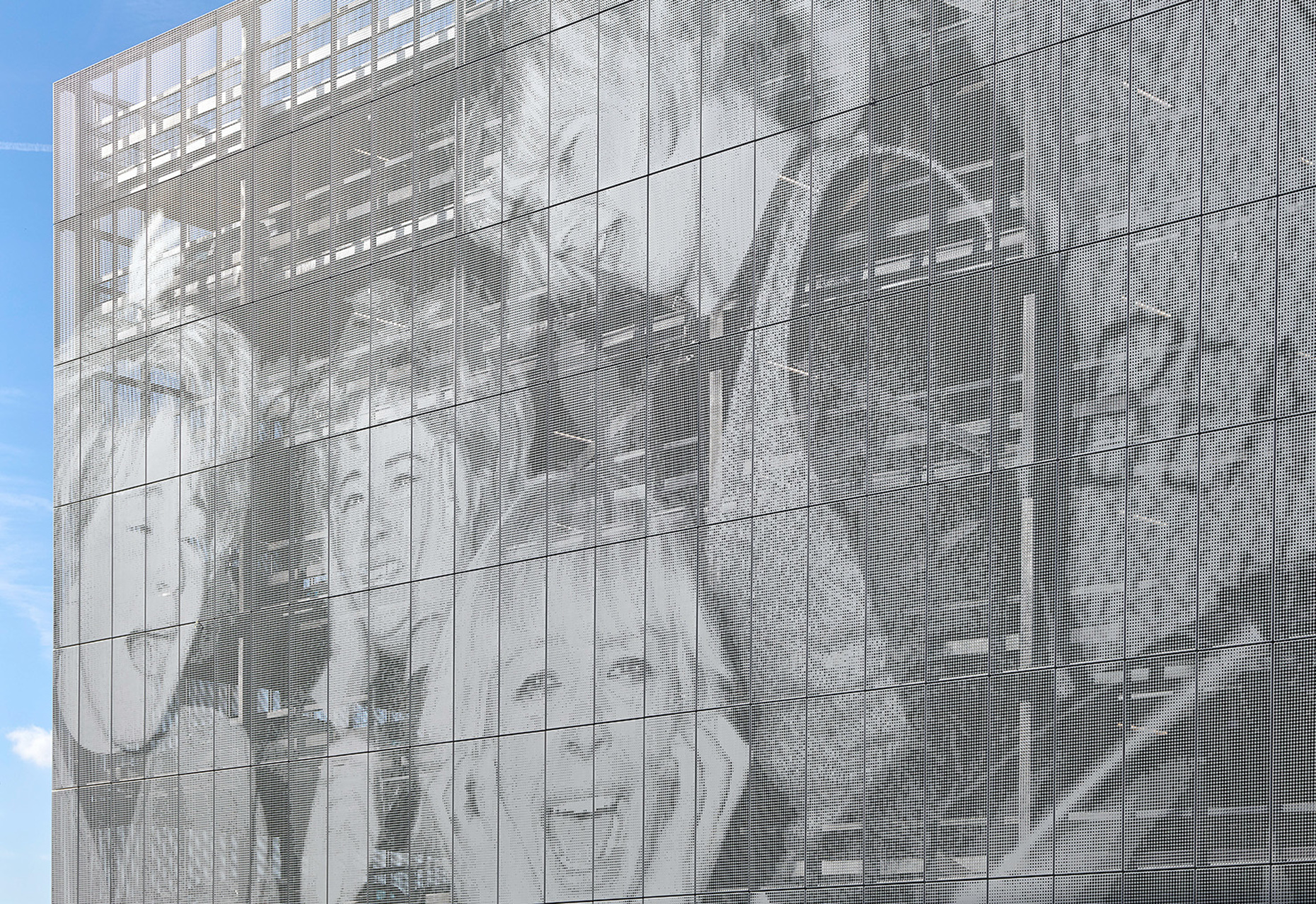 By perforating the sheets, Studio Egret West has reproduced a black and white photograph of screaming Beatles fans.
